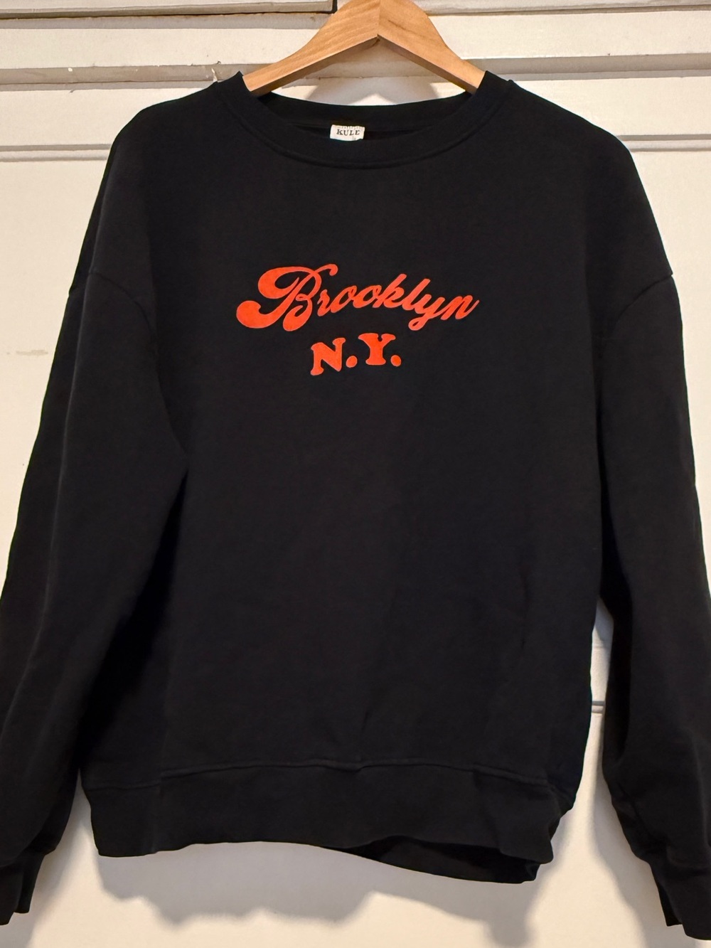 KULE Black Crewneck Sweatshirt with Orange 'Brooklyn N.Y.' Script